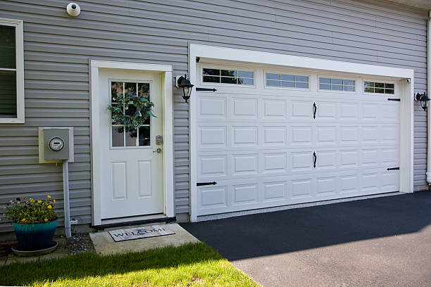 24/7 Emergency Garage Door Panel Replacement experts in Vine Grove, KY